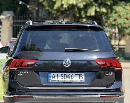 Черный Фольксваген Тигуан, объемом двигателя 2 л и пробегом 145 тыс. км за 19700 $, фото 2 на Automoto.ua