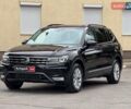 Чорний Фольксваген Тігуан, об'ємом двигуна 2 л та пробігом 143 тис. км за 18690 $, фото 1 на Automoto.ua
