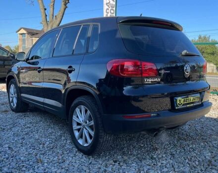 Чорний Фольксваген Тігуан, об'ємом двигуна 2 л та пробігом 142 тис. км за 12200 $, фото 6 на Automoto.ua