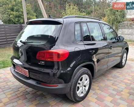 Чорний Фольксваген Тігуан, об'ємом двигуна 1.98 л та пробігом 143 тис. км за 12999 $, фото 4 на Automoto.ua