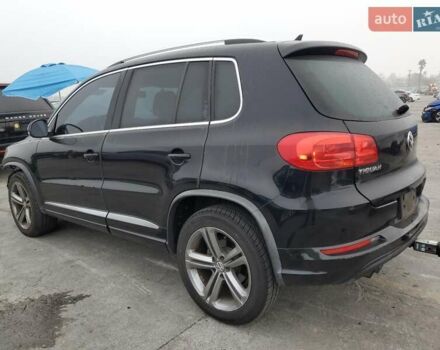 Черный Фольксваген Тигуан, объемом двигателя 1.98 л и пробегом 65 тыс. км за 650 $, фото 1 на Automoto.ua