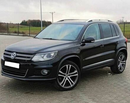 Чорний Фольксваген Тігуан, об'ємом двигуна 2 л та пробігом 82 тис. км за 10300 $, фото 1 на Automoto.ua