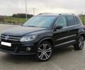 Чорний Фольксваген Тігуан, об'ємом двигуна 2 л та пробігом 82 тис. км за 10300 $, фото 1 на Automoto.ua