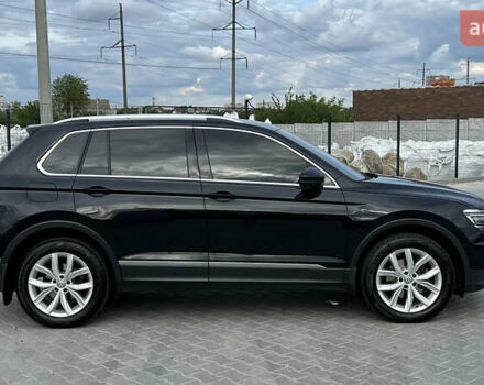 Черный Фольксваген Тигуан, объемом двигателя 1.97 л и пробегом 250 тыс. км за 23500 $, фото 3 на Automoto.ua