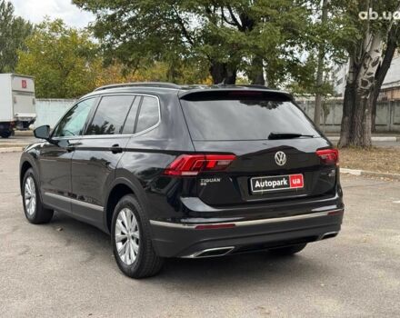 Черный Фольксваген Тигуан, объемом двигателя 2 л и пробегом 143 тыс. км за 18690 $, фото 2 на Automoto.ua