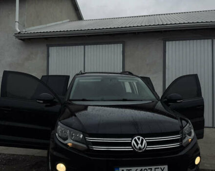 Чорний Фольксваген Тігуан, об'ємом двигуна 1.98 л та пробігом 210 тис. км за 11400 $, фото 1 на Automoto.ua