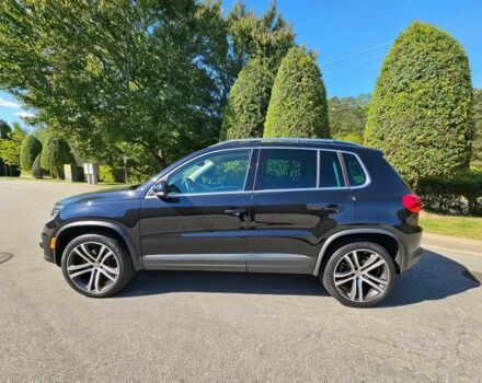 Черный Фольксваген Тигуан, объемом двигателя 2 л и пробегом 57 тыс. км за 11300 $, фото 1 на Automoto.ua