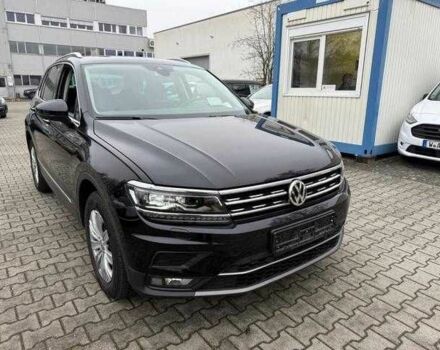 Черный Фольксваген Тигуан, объемом двигателя 2 л и пробегом 102 тыс. км за 12100 $, фото 1 на Automoto.ua