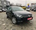 Чорний Фольксваген Тігуан, об'ємом двигуна 2 л та пробігом 187 тис. км за 10900 $, фото 1 на Automoto.ua