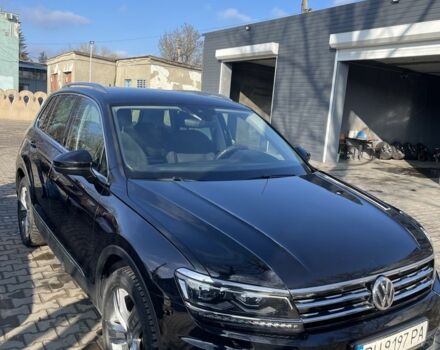 Черный Фольксваген Тигуан, объемом двигателя 2 л и пробегом 225 тыс. км за 24000 $, фото 2 на Automoto.ua
