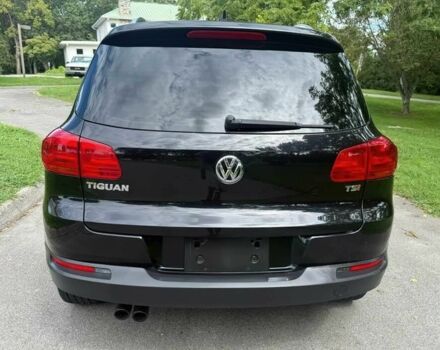 Чорний Фольксваген Тігуан, об'ємом двигуна 2 л та пробігом 52 тис. км за 3200 $, фото 4 на Automoto.ua