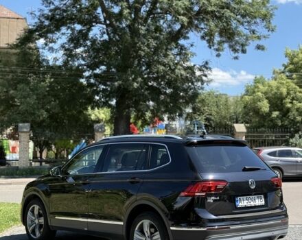 Черный Фольксваген Тигуан, объемом двигателя 2 л и пробегом 145 тыс. км за 19700 $, фото 1 на Automoto.ua