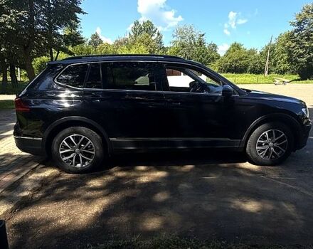 Черный Фольксваген Тигуан, объемом двигателя 2 л и пробегом 176 тыс. км за 17000 $, фото 1 на Automoto.ua