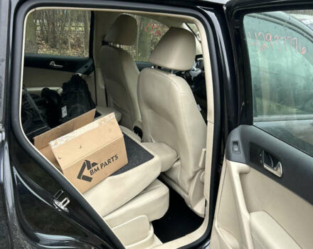 Черный Фольксваген Тигуан, объемом двигателя 1.98 л и пробегом 198 тыс. км за 8800 $, фото 10 на Automoto.ua