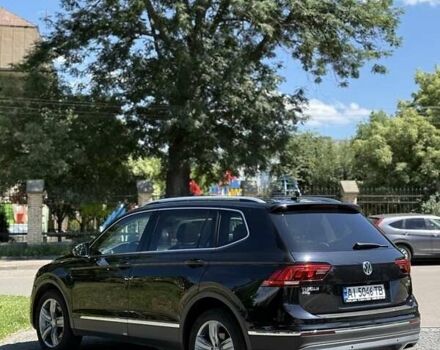 Черный Фольксваген Тигуан, объемом двигателя 2 л и пробегом 145 тыс. км за 19700 $, фото 1 на Automoto.ua