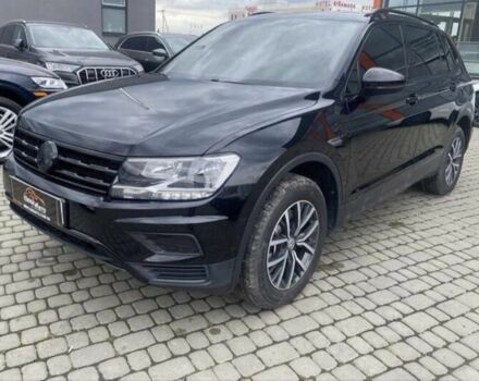 Чорний Фольксваген Тігуан, об'ємом двигуна 2 л та пробігом 131 тис. км за 18500 $, фото 1 на Automoto.ua