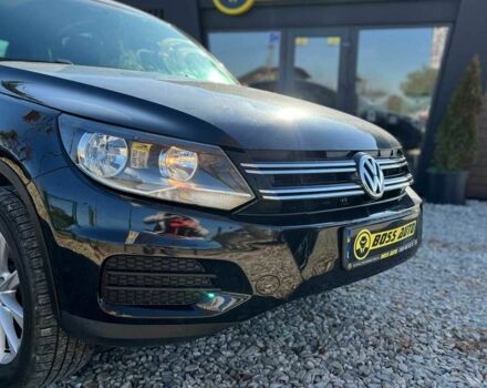 Чорний Фольксваген Тігуан, об'ємом двигуна 2 л та пробігом 142 тис. км за 12200 $, фото 1 на Automoto.ua