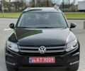 Чорний Фольксваген Тігуан, об'ємом двигуна 2 л та пробігом 104 тис. км за 14800 $, фото 1 на Automoto.ua