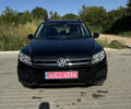 Черный Фольксваген Тигуан, объемом двигателя 2.01 л и пробегом 115 тыс. км за 13800 $, фото 1 на Automoto.ua
