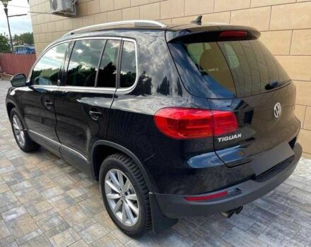 Чорний Фольксваген Тігуан, об'ємом двигуна 2 л та пробігом 153 тис. км за 12000 $, фото 3 на Automoto.ua