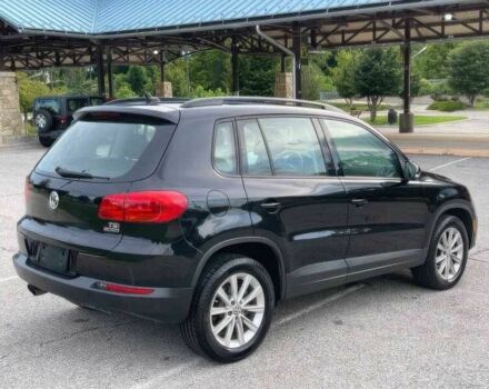 Чорний Фольксваген Тігуан, об'ємом двигуна 2 л та пробігом 123 тис. км за 3200 $, фото 4 на Automoto.ua