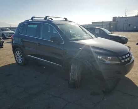 Чорний Фольксваген Тігуан, об'ємом двигуна 2 л та пробігом 136 тис. км за 10700 $, фото 2 на Automoto.ua