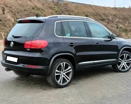 Чорний Фольксваген Тігуан, об'ємом двигуна 2 л та пробігом 82 тис. км за 10300 $, фото 2 на Automoto.ua