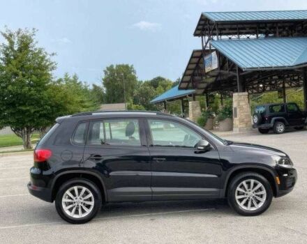 Чорний Фольксваген Тігуан, об'ємом двигуна 2 л та пробігом 123 тис. км за 3200 $, фото 3 на Automoto.ua