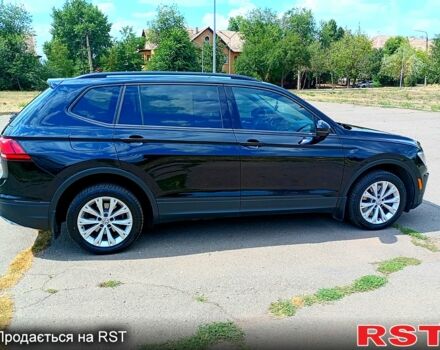 Чорний Фольксваген Тігуан, об'ємом двигуна 2 л та пробігом 93 тис. км за 15000 $, фото 6 на Automoto.ua