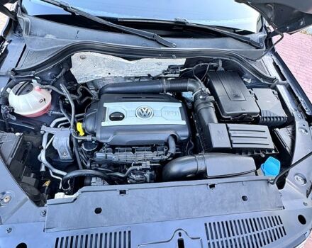 Черный Фольксваген Тигуан, объемом двигателя 2 л и пробегом 124 тыс. км за 16000 $, фото 1 на Automoto.ua