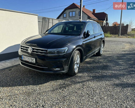 Черный Фольксваген Тигуан, объемом двигателя 1.97 л и пробегом 235 тыс. км за 21000 $, фото 1 на Automoto.ua