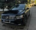Чорний Фольксваген Тігуан, об'ємом двигуна 2 л та пробігом 127 тис. км за 22000 $, фото 1 на Automoto.ua