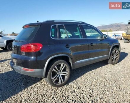Черный Фольксваген Тигуан, объемом двигателя 2 л и пробегом 80 тыс. км за 1100 $, фото 2 на Automoto.ua