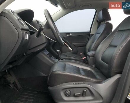 Черный Фольксваген Тигуан, объемом двигателя 1.98 л и пробегом 65 тыс. км за 650 $, фото 6 на Automoto.ua