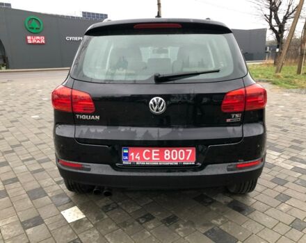 Чорний Фольксваген Тігуан, об'ємом двигуна 2 л та пробігом 187 тис. км за 10900 $, фото 1 на Automoto.ua
