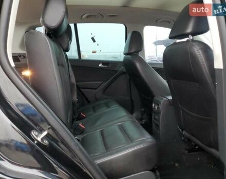 Черный Фольксваген Тигуан, объемом двигателя 1.98 л и пробегом 65 тыс. км за 650 $, фото 10 на Automoto.ua