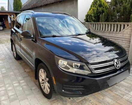 Чорний Фольксваген Тігуан, об'ємом двигуна 2 л та пробігом 153 тис. км за 12000 $, фото 1 на Automoto.ua