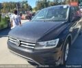 Черный Фольксваген Тигуан, объемом двигателя 2 л и пробегом 175 тыс. км за 7300 $, фото 1 на Automoto.ua