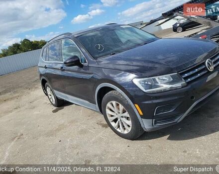 Черный Фольксваген Тигуан, объемом двигателя 2 л и пробегом 175 тыс. км за 7300 $, фото 2 на Automoto.ua