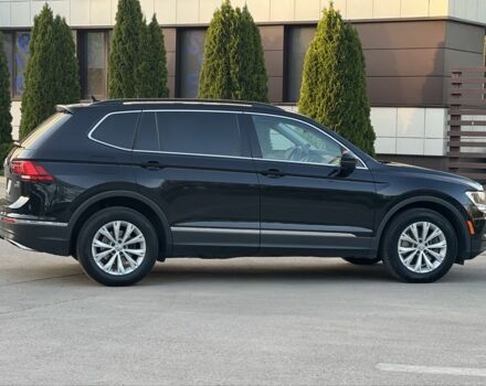 Чорний Фольксваген Тігуан, об'ємом двигуна 2 л та пробігом 123 тис. км за 18400 $, фото 7 на Automoto.ua