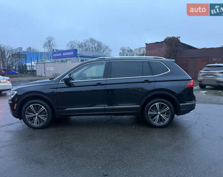 Чорний Фольксваген Тігуан, об'ємом двигуна 2 л та пробігом 162 тис. км за 18750 $, фото 5 на Automoto.ua