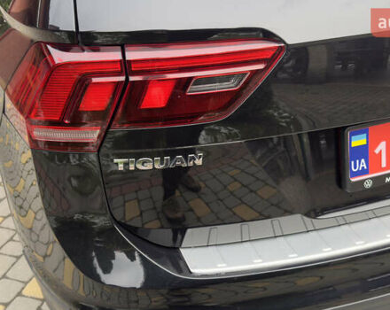 Чорний Фольксваген Тігуан, об'ємом двигуна 1.98 л та пробігом 258 тис. км за 23300 $, фото 23 на Automoto.ua
