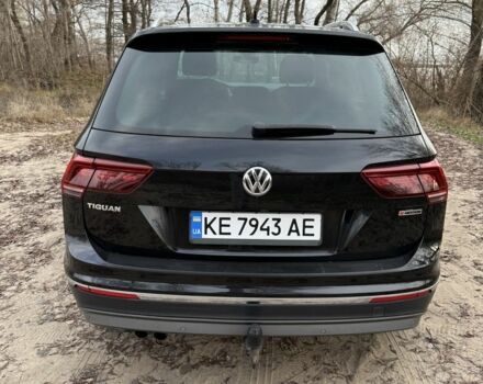 Черный Фольксваген Тигуан, объемом двигателя 2 л и пробегом 182 тыс. км за 27499 $, фото 2 на Automoto.ua