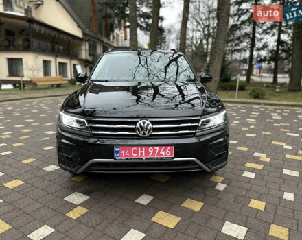 Чорний Фольксваген Тігуан, об'ємом двигуна 2 л та пробігом 186 тис. км за 17300 $, фото 2 на Automoto.ua