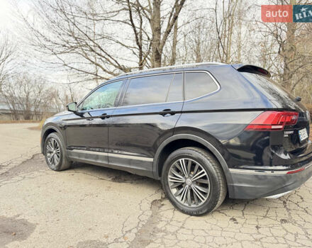 Черный Фольксваген Тигуан, объемом двигателя 2 л и пробегом 183 тыс. км за 19700 $, фото 2 на Automoto.ua