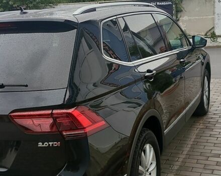 Чорний Фольксваген Тігуан, об'ємом двигуна 2 л та пробігом 260 тис. км за 24950 $, фото 4 на Automoto.ua