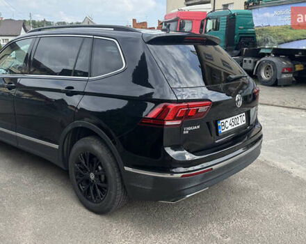 Чорний Фольксваген Тігуан, об'ємом двигуна 1.98 л та пробігом 62 тис. км за 17950 $, фото 9 на Automoto.ua