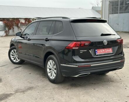 Чорний Фольксваген Тігуан, об'ємом двигуна 2 л та пробігом 139 тис. км за 16900 $, фото 2 на Automoto.ua