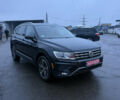 Чорний Фольксваген Тігуан, об'ємом двигуна 2 л та пробігом 162 тис. км за 18750 $, фото 1 на Automoto.ua