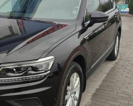 Чорний Фольксваген Тігуан, об'ємом двигуна 2 л та пробігом 260 тис. км за 24950 $, фото 2 на Automoto.ua